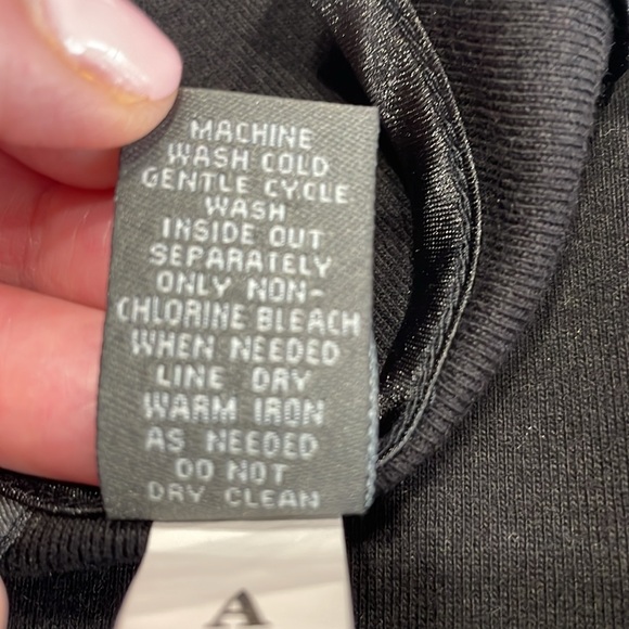 Chico’s Additions, size 2 (12/14). Black Long Sleeve Tee/ rhinestone buttons - Picture 6 of 6